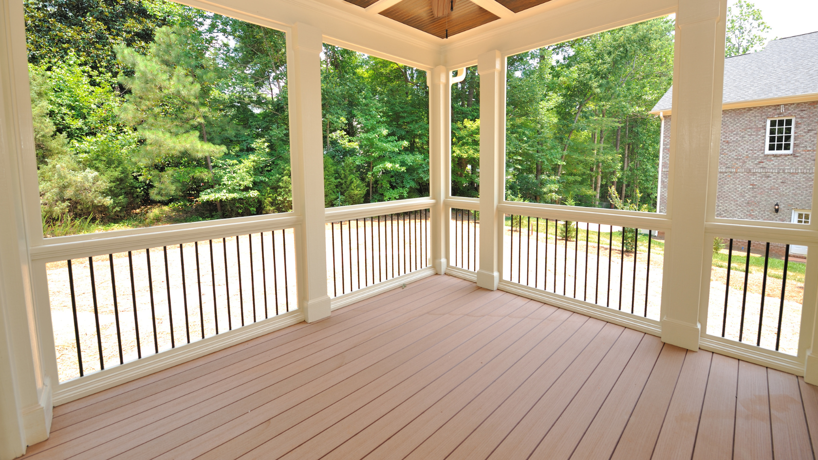 A porch with a ceiling fan and a ceiling fan