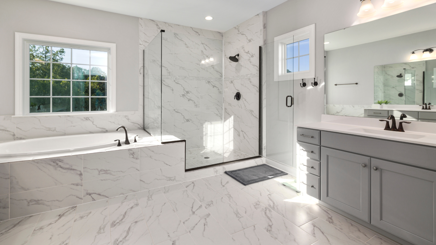 A large white bathroom with a walk in shower